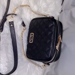 Itzy Ritzy double take cross body diaper bag